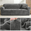 A dark gray stretch velvet sofa slipcover shown in a full view and close-ups of the fabric texture.