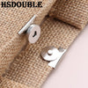 Silver magnetic button clasps attached to a beige woven fabric strap.