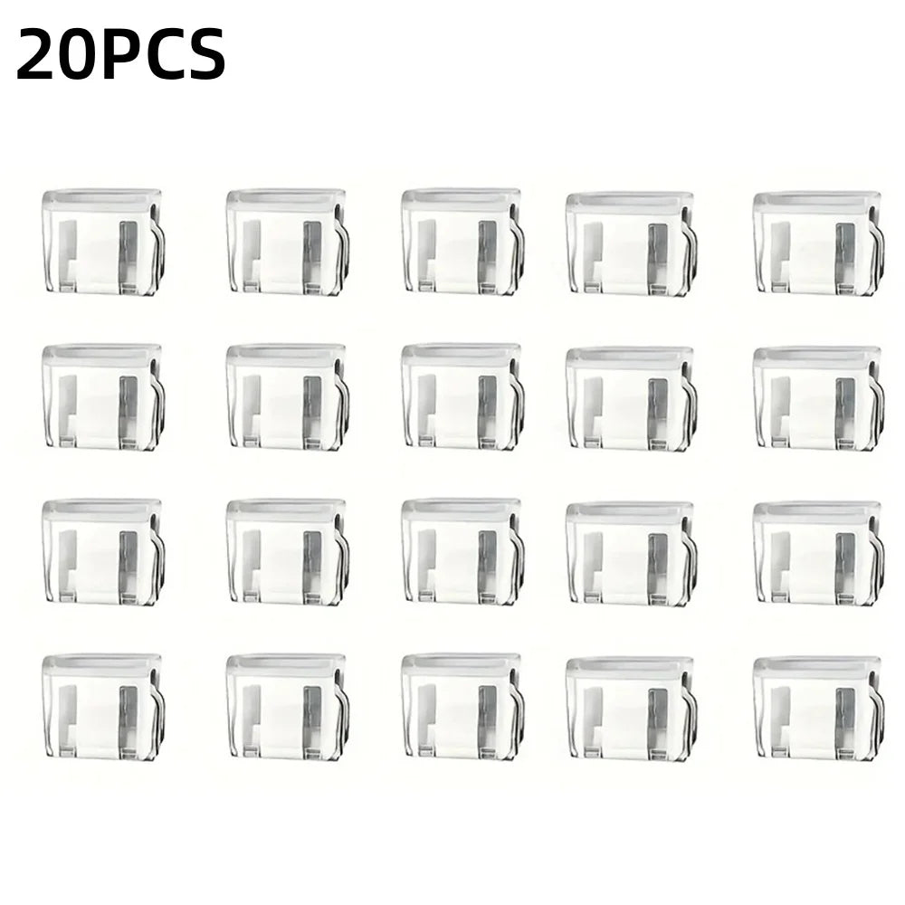 A set of 20 clear invisible pant hem clips used as non-slip adjusters for trousers.