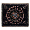 A dark throw blanket featuring a geometric mandala design in shades of pink, orange, and teal.