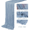 Light blue boho gauze table runner fabric showing soft texture, sheer quality, and clean edge.