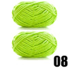 A ball of bright lime green thick velvet yarn for knitting and crochet projects.