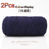 A skein of dark navy blue elastic yarn is displayed, ready for crafting.