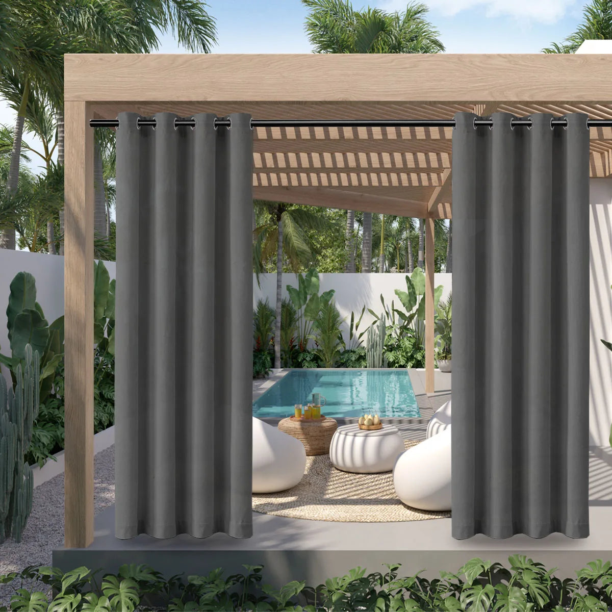 Gray waterproof outdoor curtain with grommet top hanging in a wooden pergola structure.