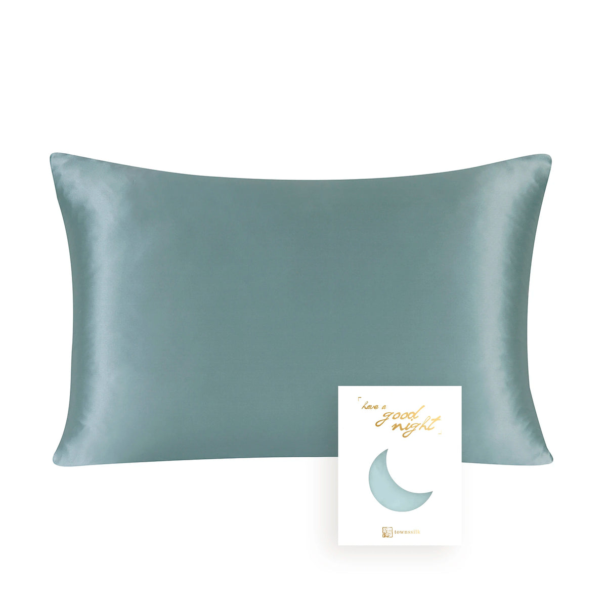 A smooth, sage green mulberry silk pillowcase with a crescent moon design.