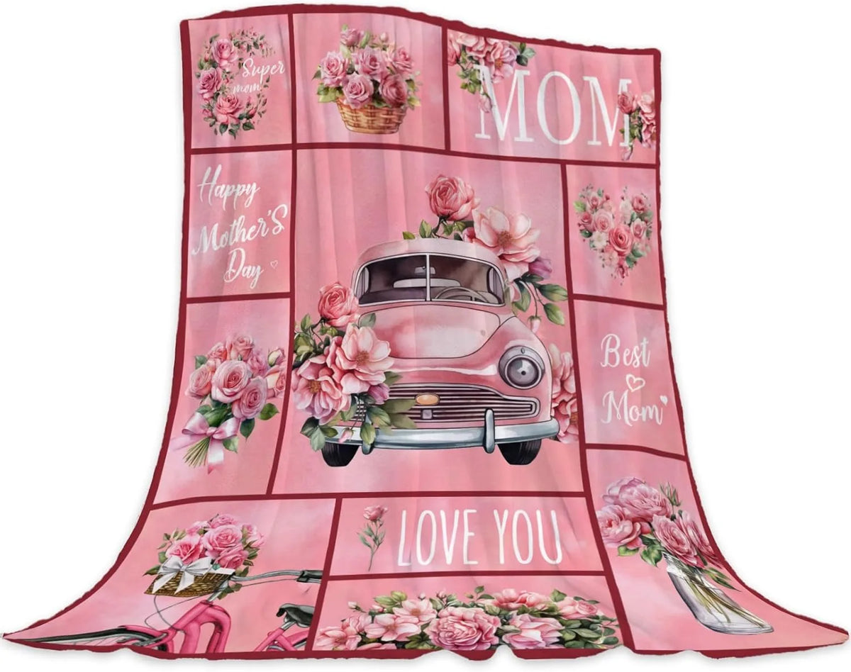 A pink floral print throw blanket featuring a vintage car design and 'Happy Mother's Day' text.