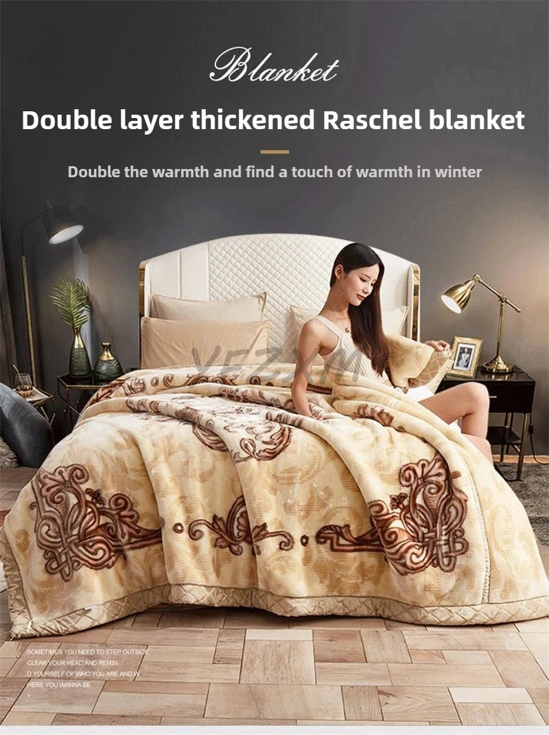 A woman relaxing on a bed with a thick, tan and brown patterned blanket.