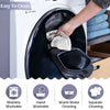 A hand is placing a cloth into the drum of a washing machine for cleaning sofa cushion protector covers.