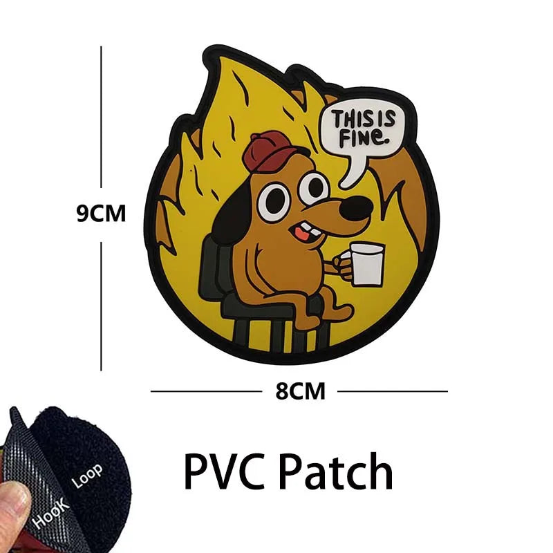 A yellow patch featuring a dog character saying This is fine with a speech bubble and holding a cup.