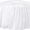 White elegant ruffled bed skirt set with gathered fabric and pleats