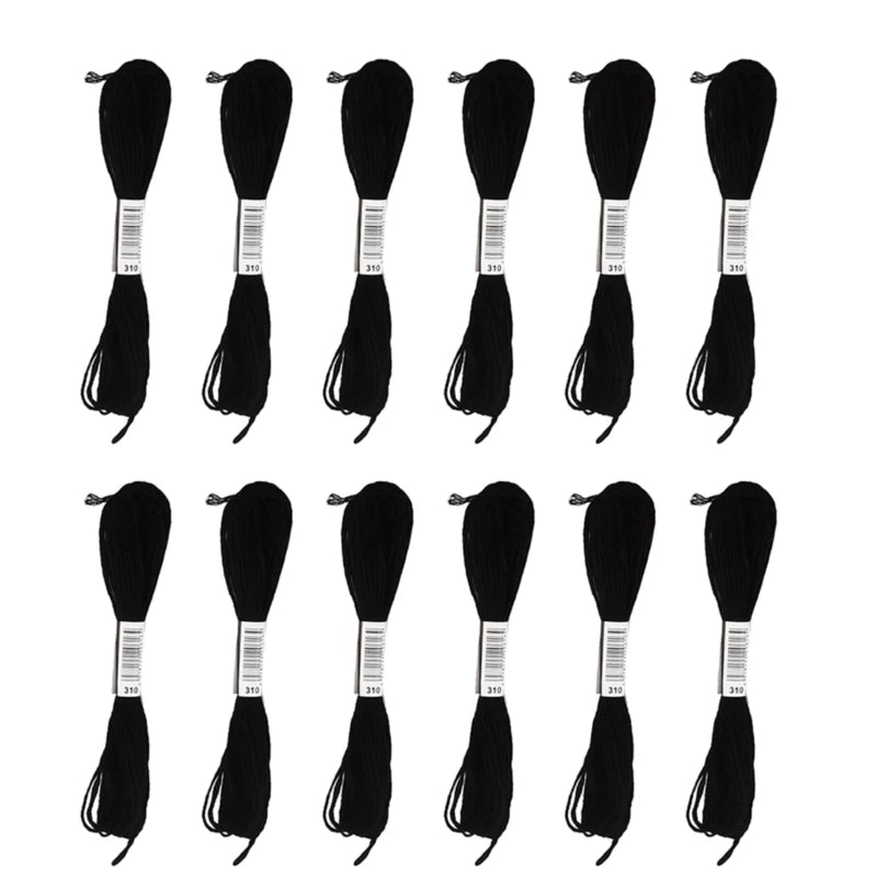 A set of black embroidery floss threads shown in various lengths and colors.