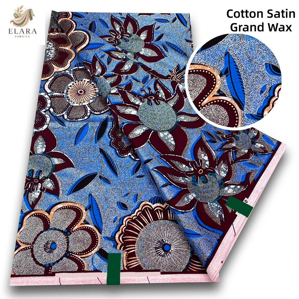 Cotton Satin Grand Wax fabric featuring intricate floral and leaf patterns in blue, purple, and brown tones