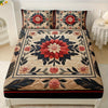A floral print fitted sheet set featuring red and pink flowers on a beige background with matching pillowcases.