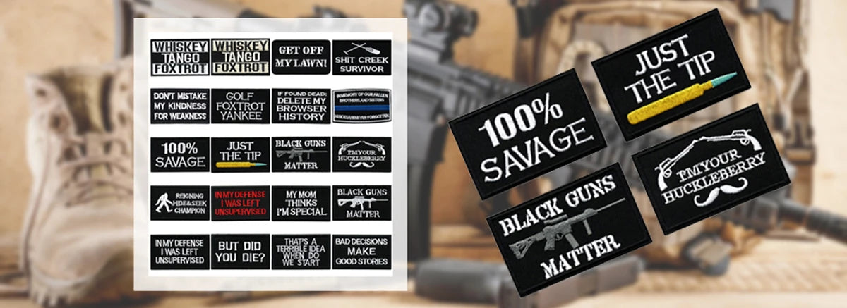 A collection of black and white embroidered letter patches featuring various phrases like Just The Tip 100% Savage and Black 