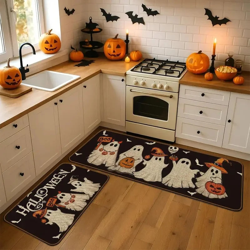 A black and white Halloween ghost pumpkin print non-slip kitchen rug set placed on a wooden floor.
