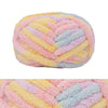 A ball of hand-knitted wool finger line scarf featuring pastel pink, yellow, and blue colors.