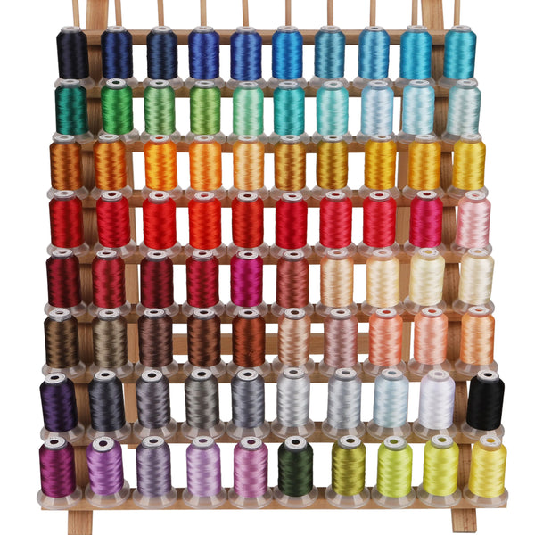 A wooden rack displaying a large set of 80 colored polyester embroidery threads in spools.