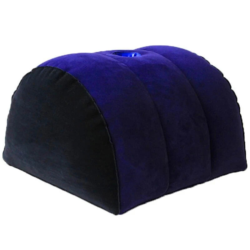 A dark blue and black inflatable body support pillow for travel, bed, or yoga.