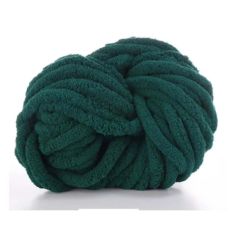 A ball of dark green chunky chenille yarn is shown from above.