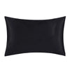 A smooth black satin silk pillowcase.