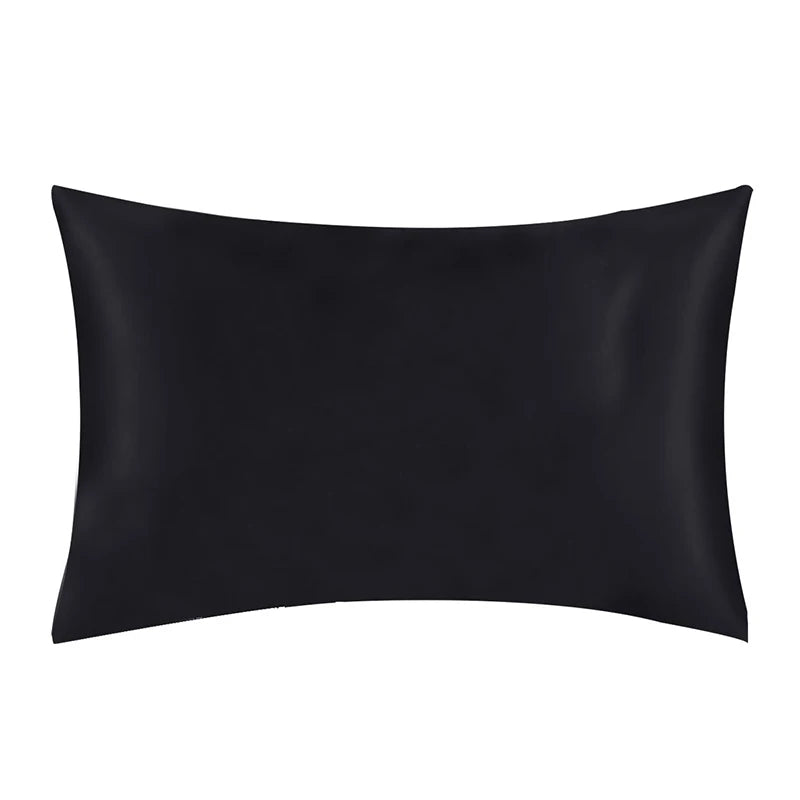 A smooth black satin silk pillowcase.