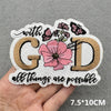 Pink embroidered slogan patches featuring the letters GD and a floral design with the text all things are possible