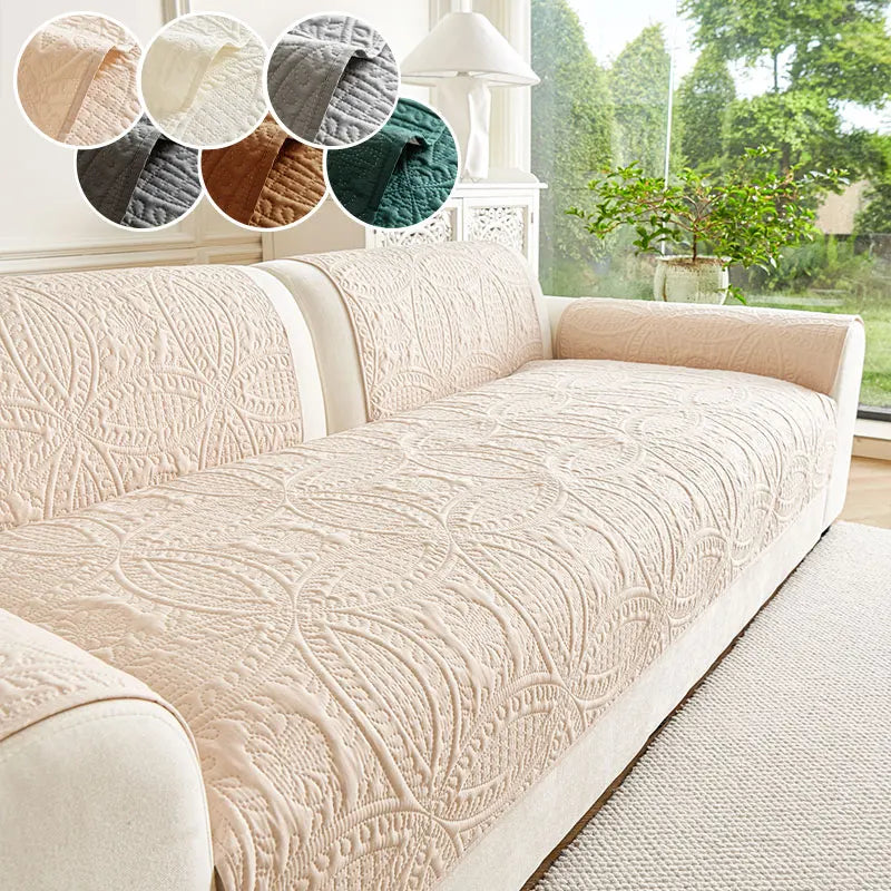 A beige textured sofa cushion displayed with various fabric swatches and natural light in a bright room.