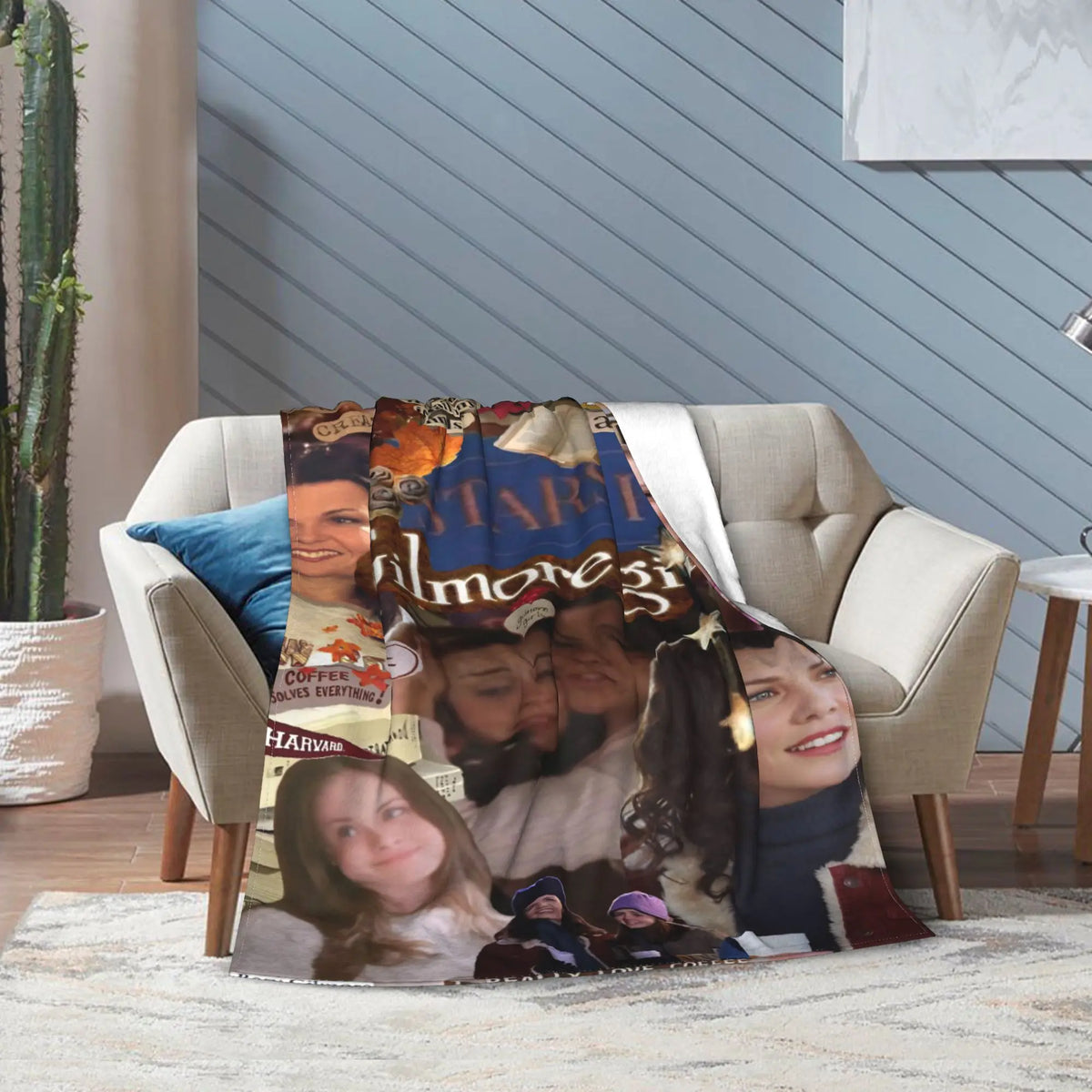 A cozy knit throw blanket featuring a collage of faces and warm colors draped over a light-colored sofa.