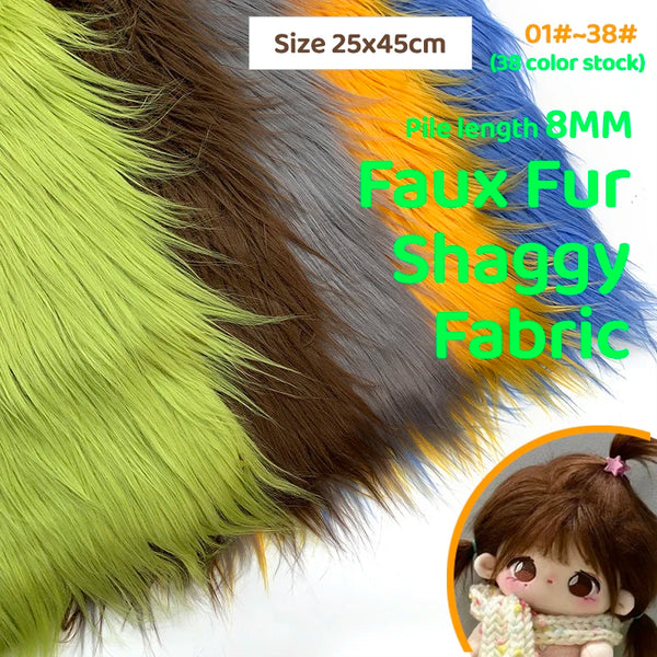 A display of various colored faux fur fabric strips, including green, brown, orange, and blue, with a close-up of a plush toy