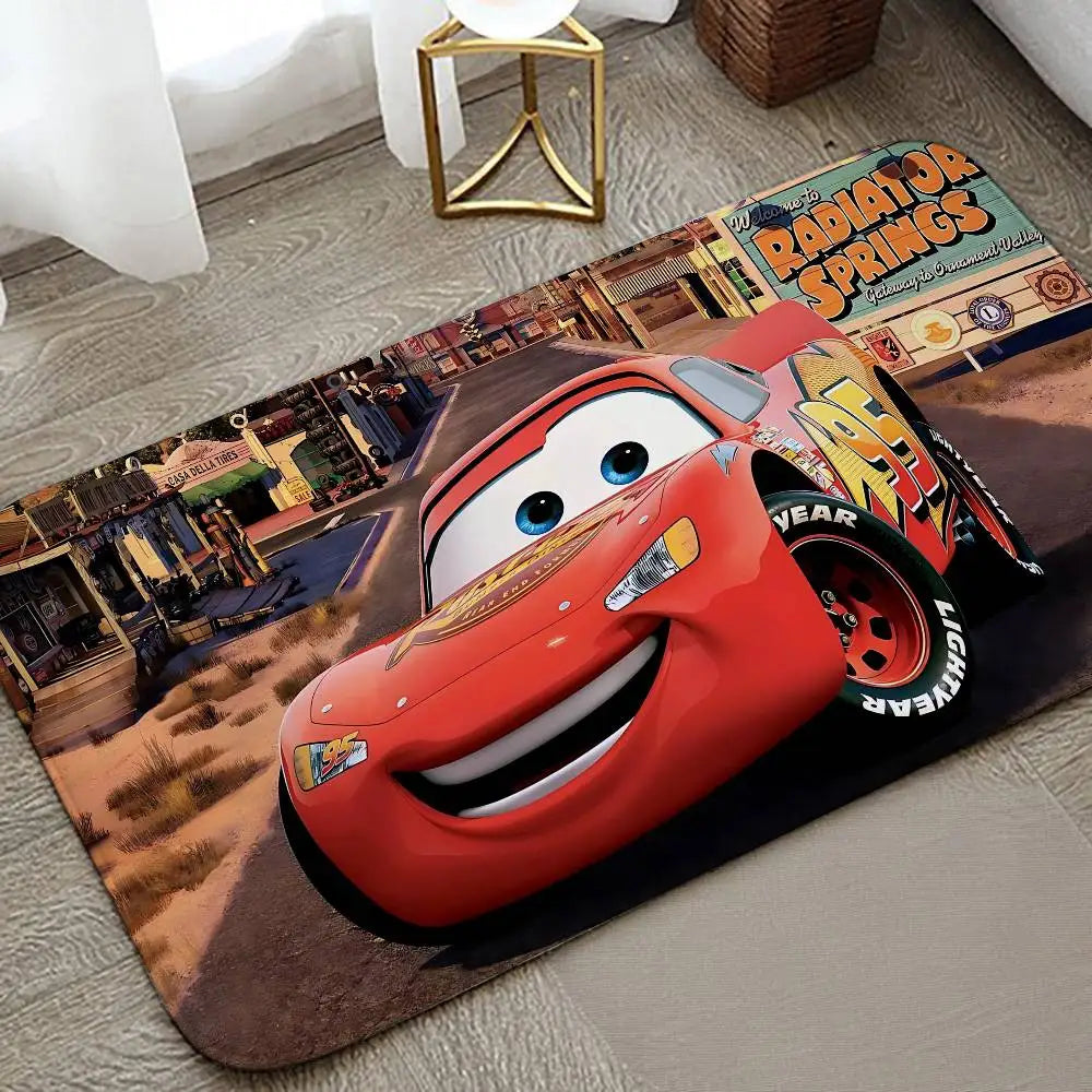 A cartoon orange and red vehicle design on an anti-slip door mat.