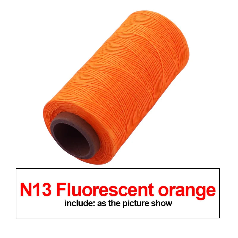 A roll of N13 fluorescent orange waxed thread for leather and crafting.