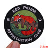A black embroidered patch featuring a red panda illustration with text reading Red Panda Appreciation Club.
