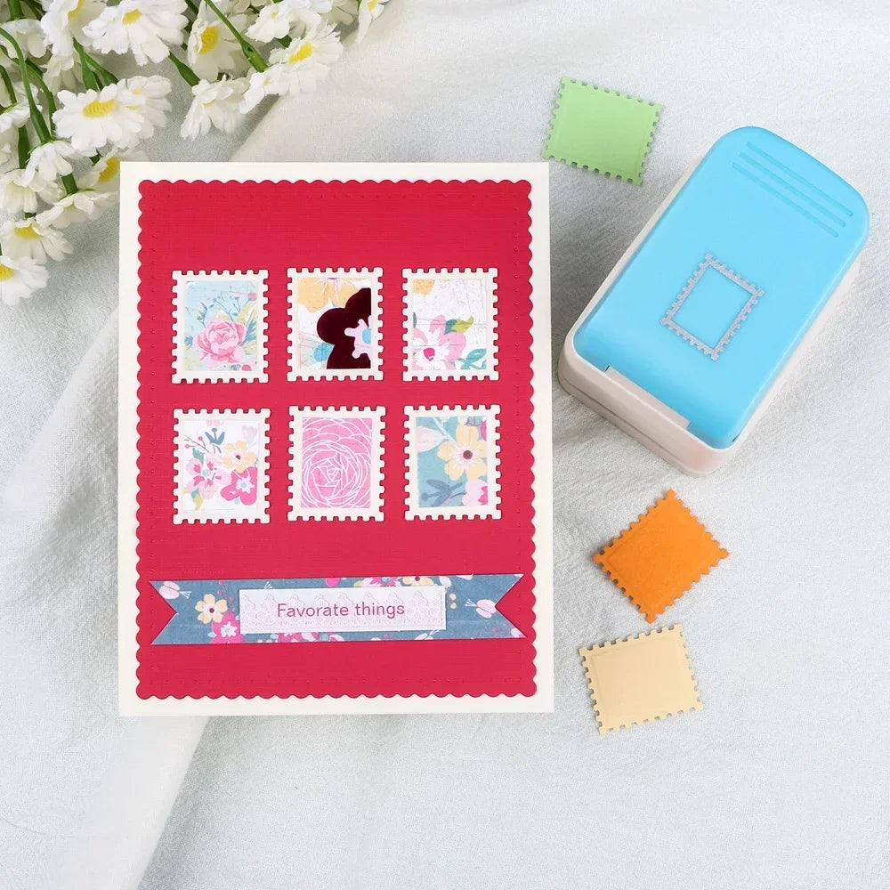 A set of precision embossing and punching tools with various colored stamps and a blue plastic tool on a white background.