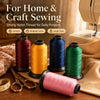 Rolls of strong nylon sewing thread in various colors and a pink spool are displayed on a wooden surface.