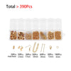 A set of bulk jewelry making findings including various sizes and types of gold-colored components like clasps, jump rings, a