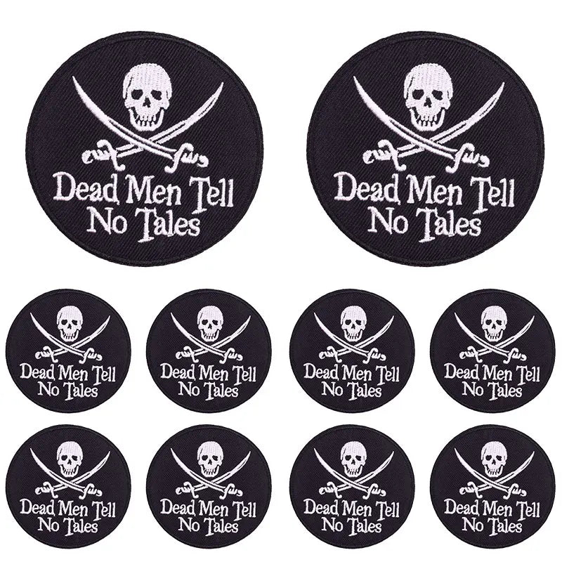 Set of black embroidered patches featuring the slogan Dead Men Tell No Tales