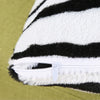 A close-up view of a black and white zebra stripe fabric, likely for throw pillow covers.