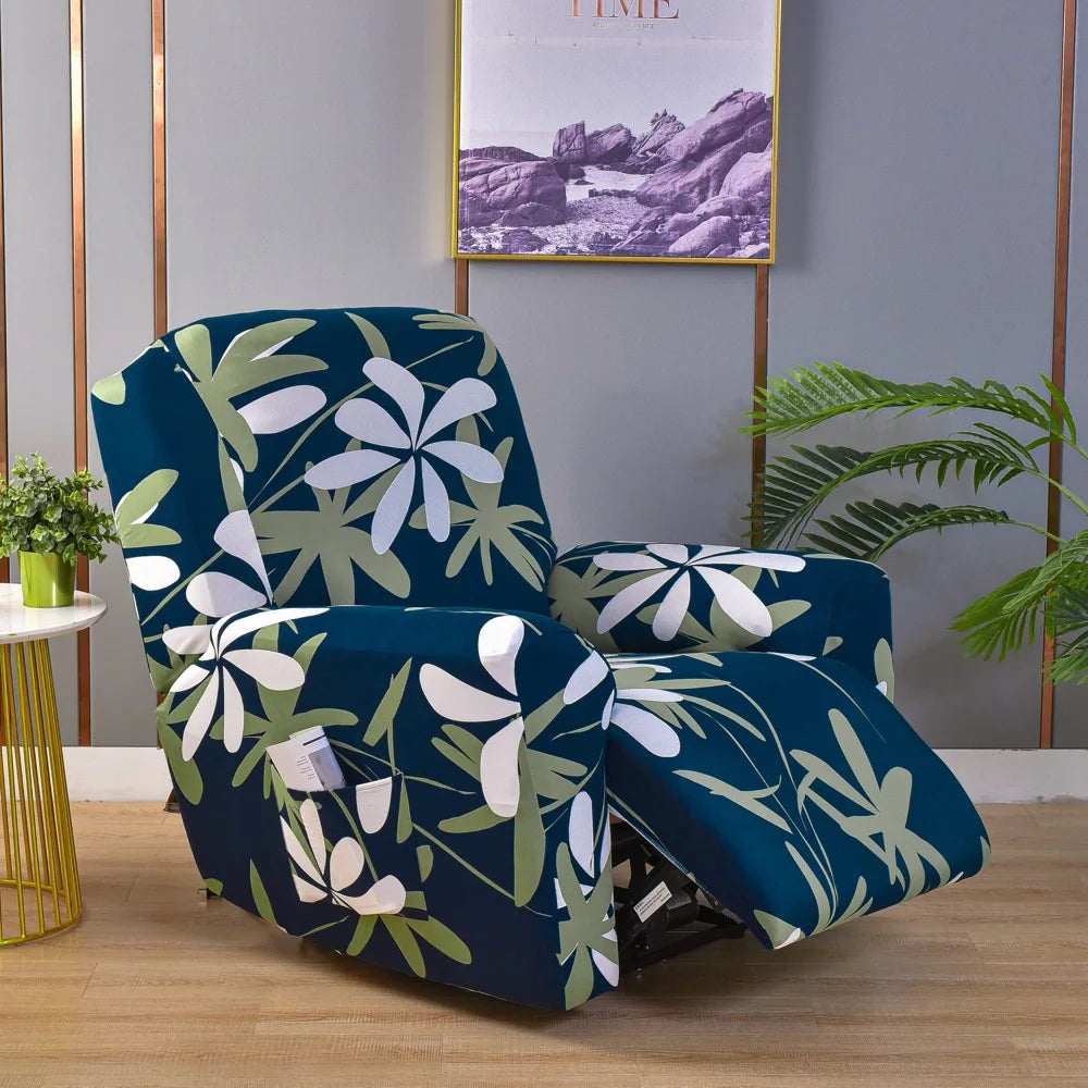 A deep teal floral print recliner and sofa slipcover set displayed in a modern room.