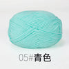 A ball of light turquoise organic cotton knitting yarn for crafts.
