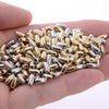 A handful of mixed gold and silver geometric acrylic beads for jewelry making