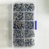 A clear plastic container holds a set of silver and black five claw buckle clamps for fabric and accessories.