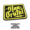 Black and yellow embroidered patch with the text Stay Brutal on a black background