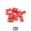 A pile of red adjustable plastic paracord buckle bracelets.