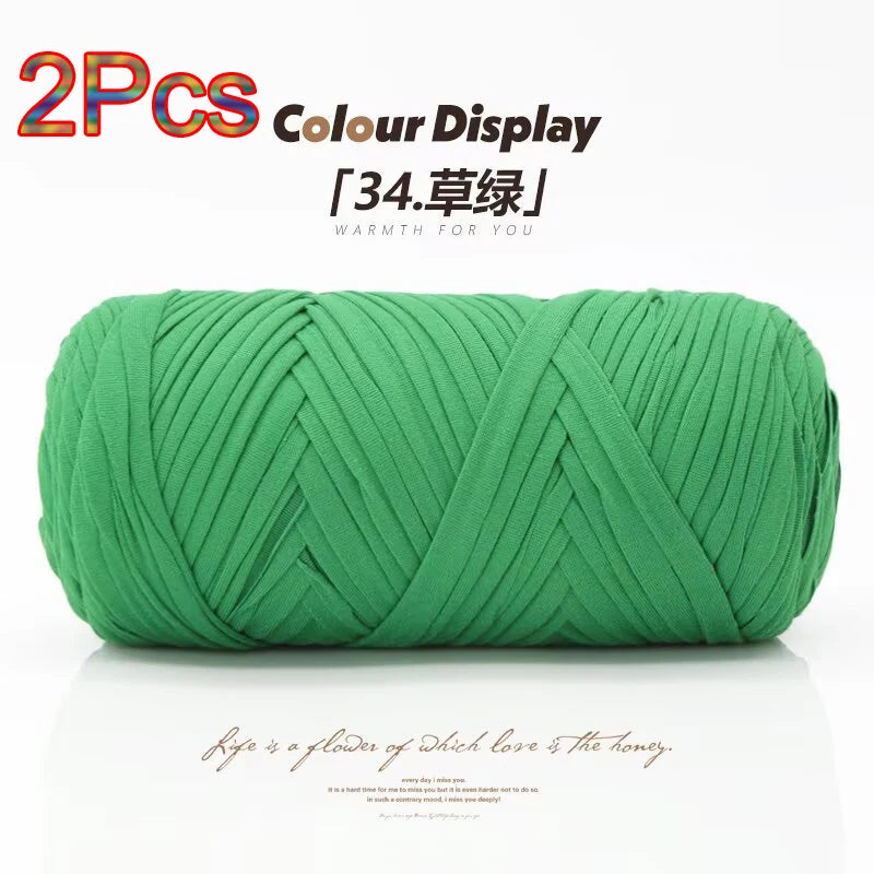 A spool of bright green reusable elastic yarn used for crafting.