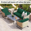 A dark green removable elastic sofa seat cushion cover is shown on an outdoor patio with wicker furniture.