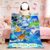 A bright blue Frutiger Aero art throw blanket featuring colorful fruit and nature designs