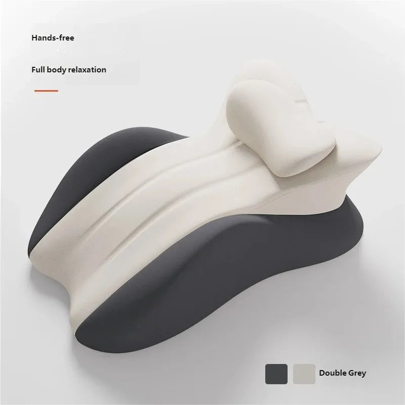 A beige ergonomic memory foam wedge pillow shown in profile with a dark grey accent.