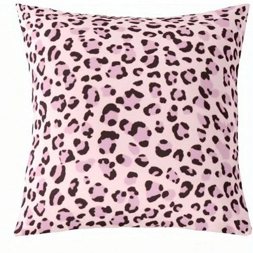 A square decorative pillow cover with a pink leopard print pattern.