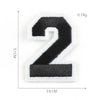 A black and white embroidered number 2 patch with dimensions of 5.1 cm by 3.8 cm and a weight of 0.74g.