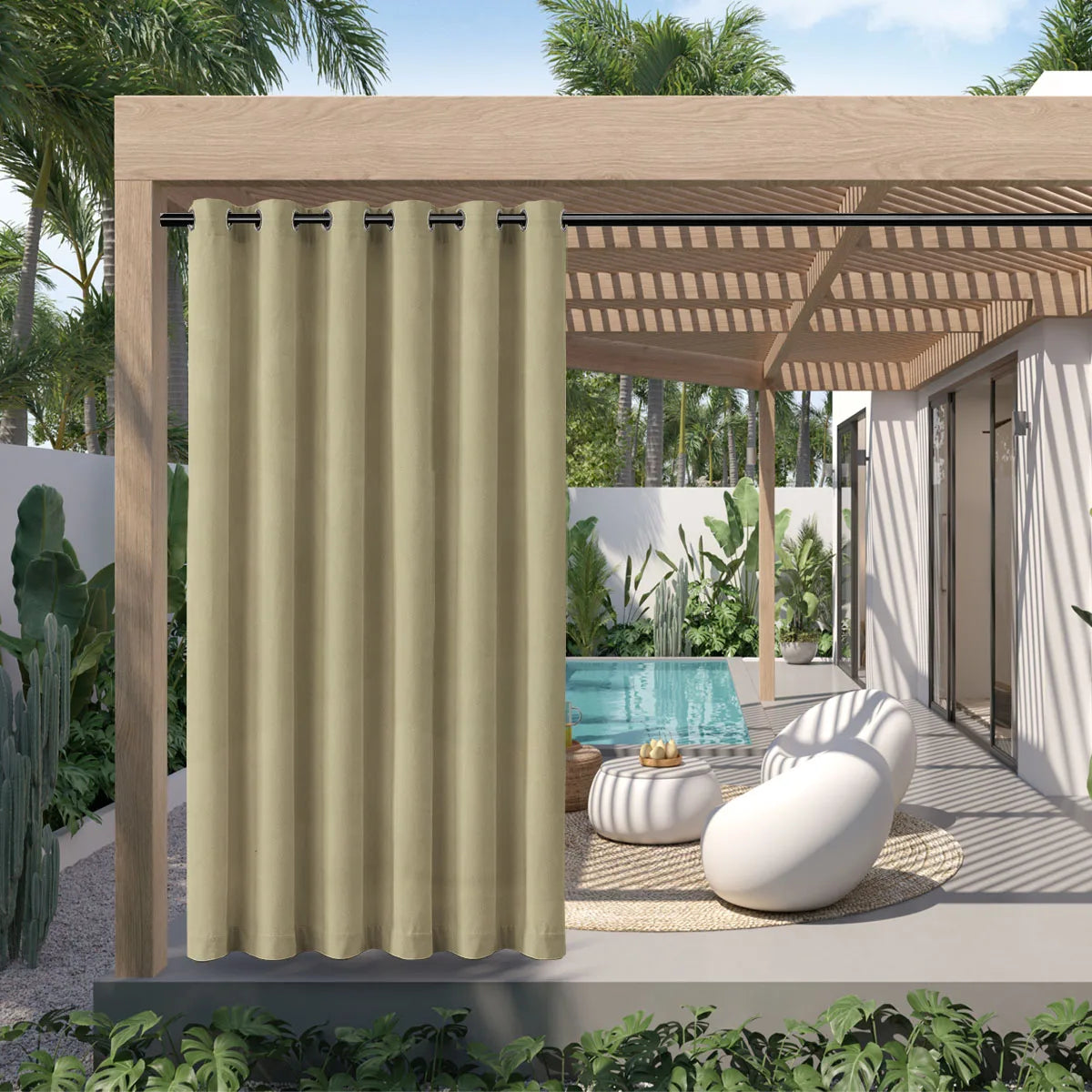 A beige waterproof outdoor curtain with a grommet top hanging in a wooden pergola setting.